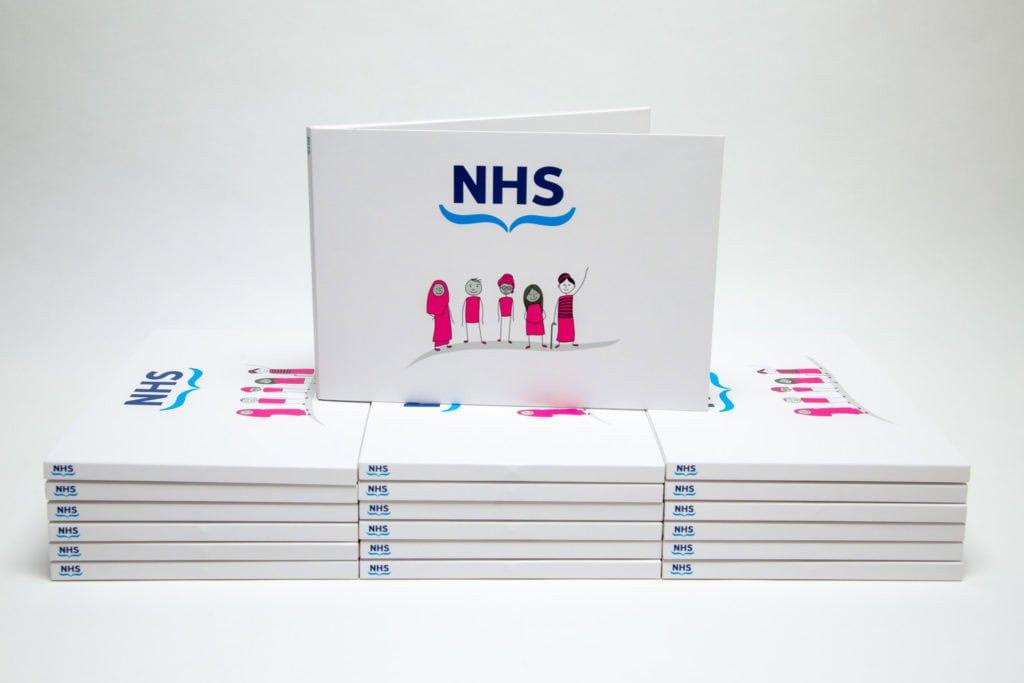 A stack of NHS video brochures.