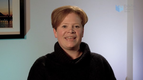 A woman is shown talking to the viewers of the video.