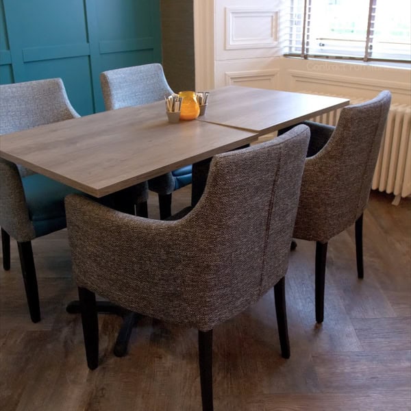 Table and chairs in a bar.