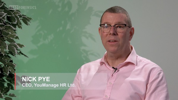 A man is interviewed.