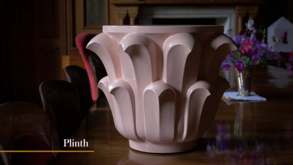 A light pink ceramic vase.